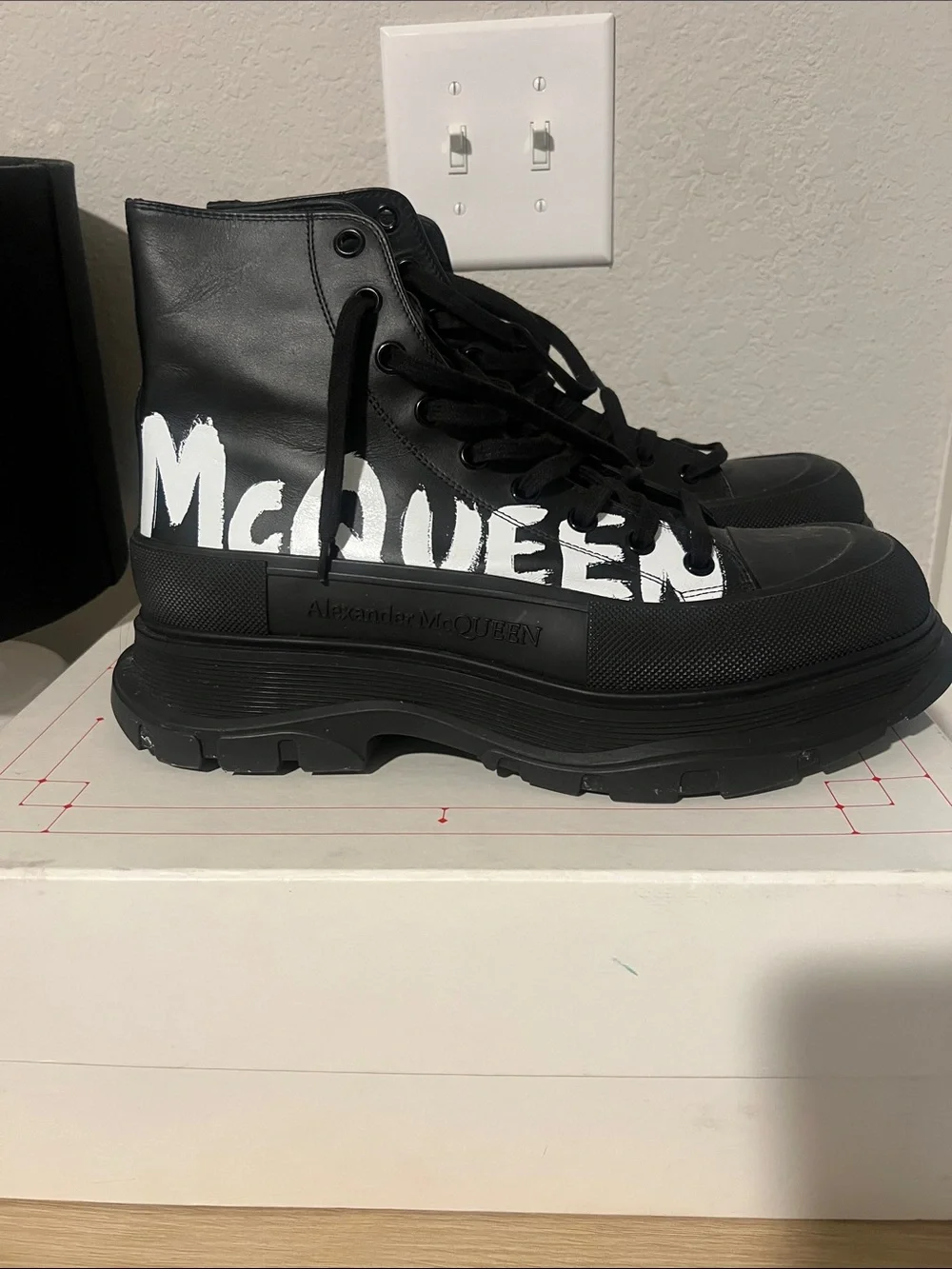 Alexander McQueen Black High-Top Sneakers with White Logo Paint